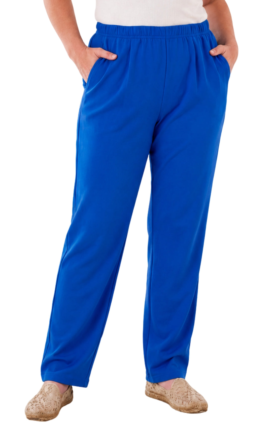 Person wearing blue pants on a white background