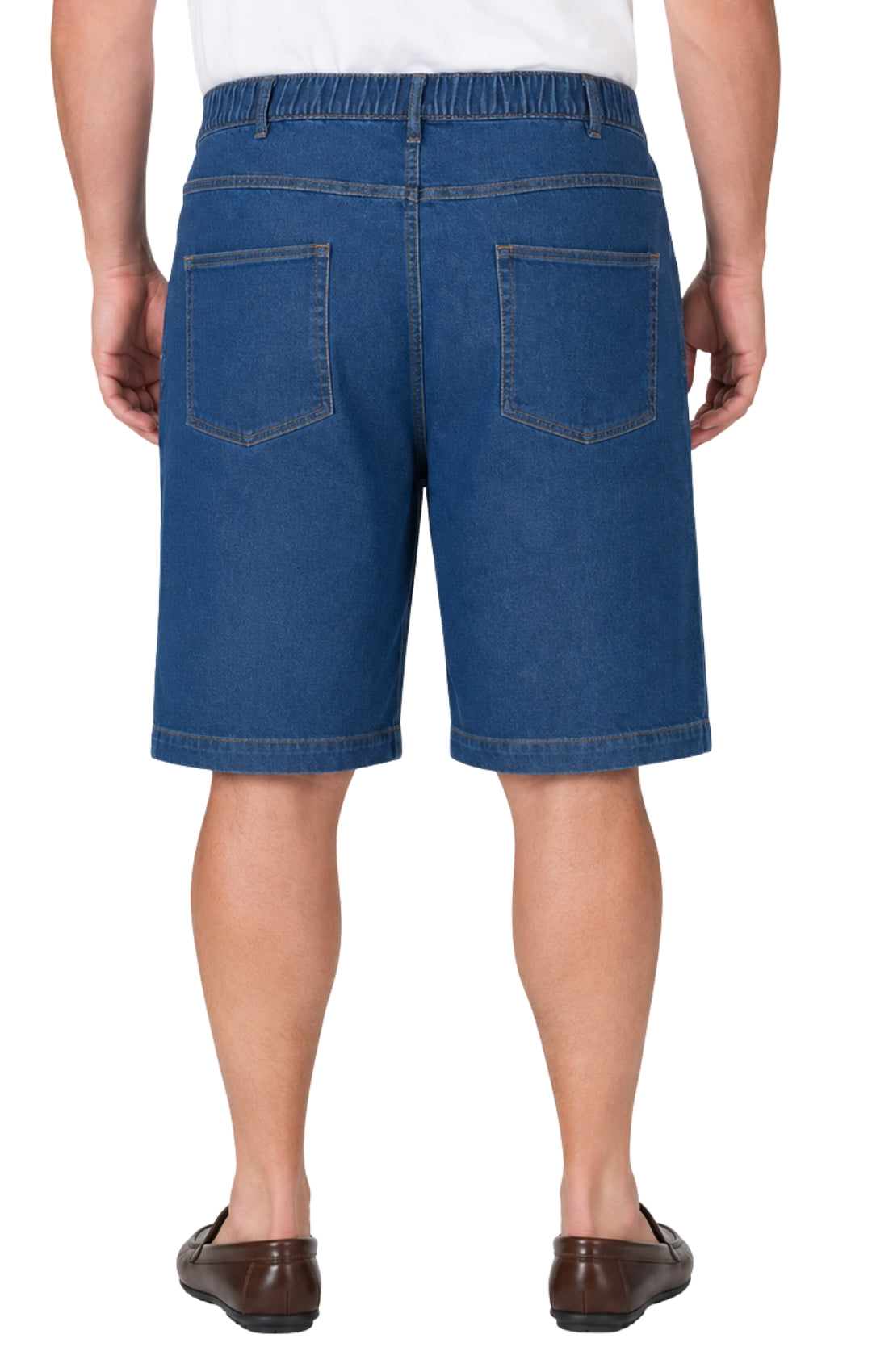 Person wearing blue denim shorts on a white background