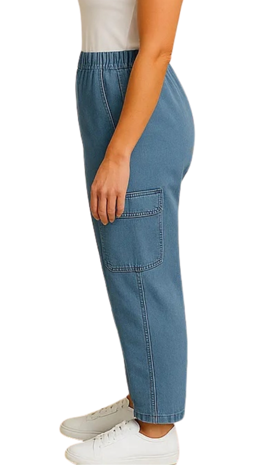 Blue cargo pants worn by a person on a white background